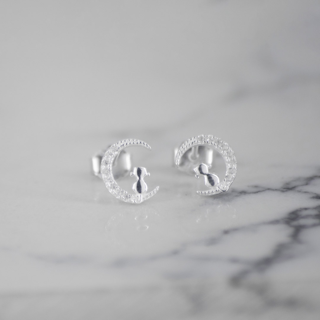 TOPO MEDIA LUNA GATO SENTADO